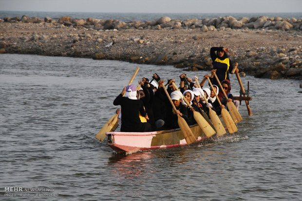 Dragon boat sailing in Persian Gulf waters