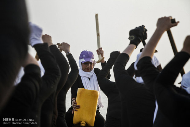 Dragon boat sailing in Persian Gulf waters