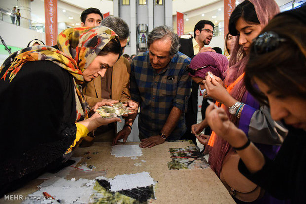 ساخت بزرگترین پازل با موضوع سمفونی لک لک ها 