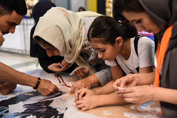 ساخت بزرگترین پازل با موضوع سمفونی لک لک ها 