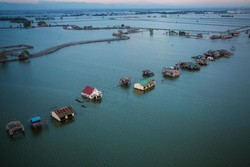 Flooding is frequent in the mudflats north of Manila in the Philippines, where the city has expanded due to rising population. Sea level rise threatens many such low-lying areas around the world/ Phot