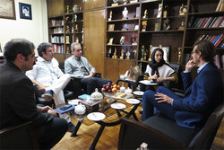 The first secretary and director of the Cultural Section of the German Embassy, Justus Kemper (R), meets the organizers of the Fajr International Theater Festival in Tehran on July 11, 2018.
