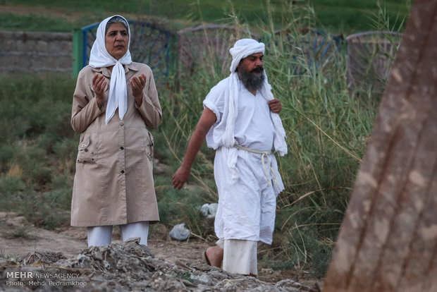 Mandaeans performing baptism in Karun River