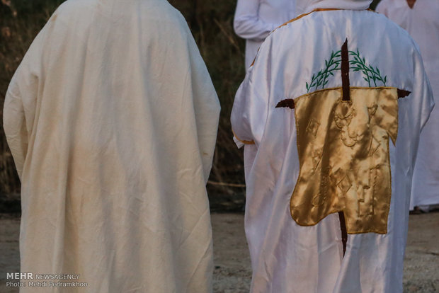 Mandaeans performing baptism in Karun River