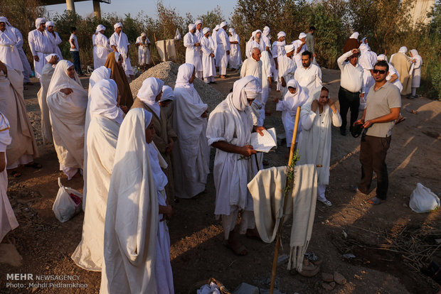 Mandaeans performing baptism in Karun River