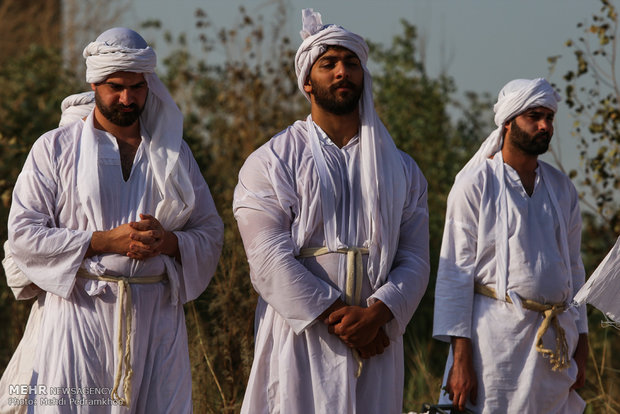 Mandaeans performing baptism in Karun River