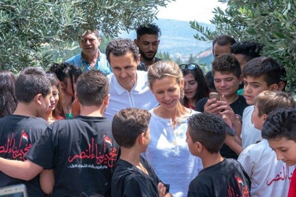 دیدار بشار اسد و همسرش با فرزندان شهدا و جانبازان در سوریه