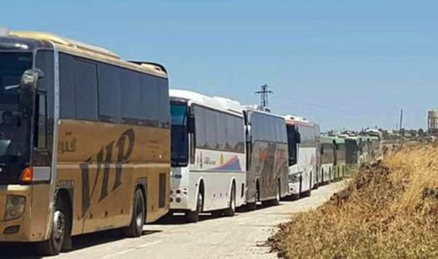 55 buses transporting hundreds of terrorists ,their families leave Quneitra 