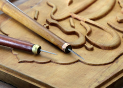 Detail of a wood-carved panel being crafted at a workshop in Abadeh, southcentral Iran  