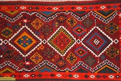 Handmade kilims on display at Carpet Museum of Iran