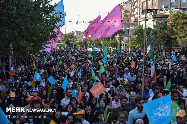 Showering Holy Shrine of Imam Reza (AS) with flowers 