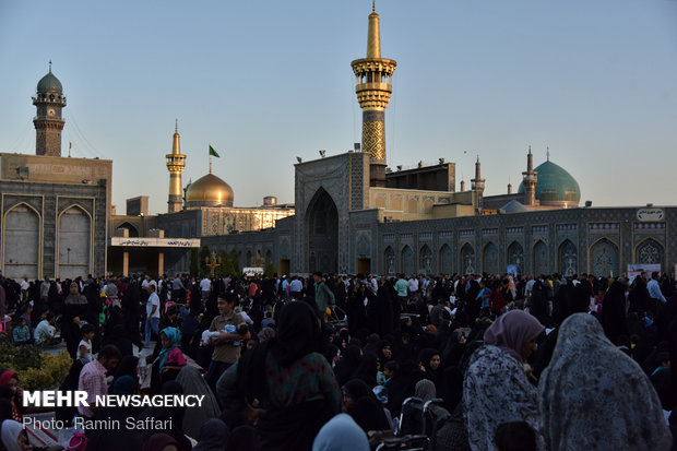 Showering Holy Shrine of Imam Reza (AS) with flowers 