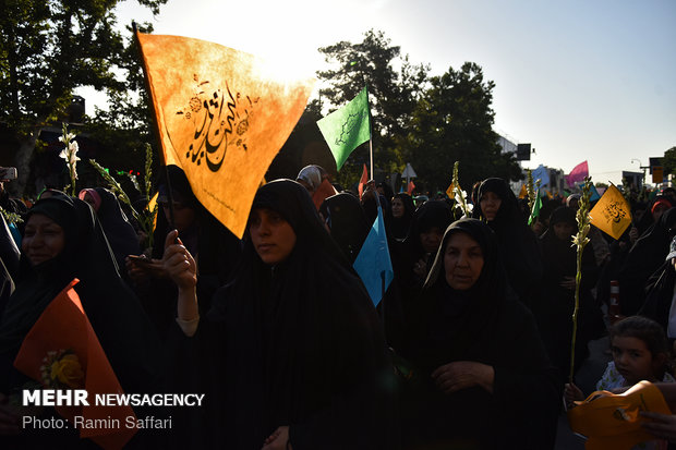 Showering Holy Shrine of Imam Reza (AS) with flowers 