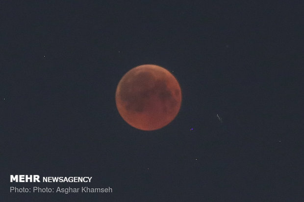 Iranians watch longest eclipse of century