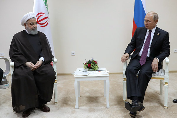 Rouhani, Putin vow to keep interactions on regional, intl. issues