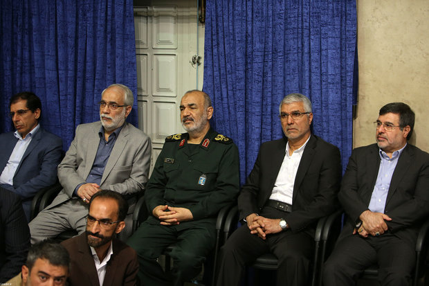Various groups  of people meet with Leader