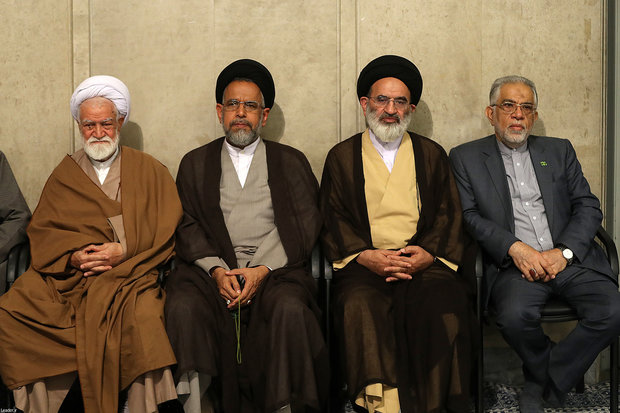 Various groups  of people meet with Leader