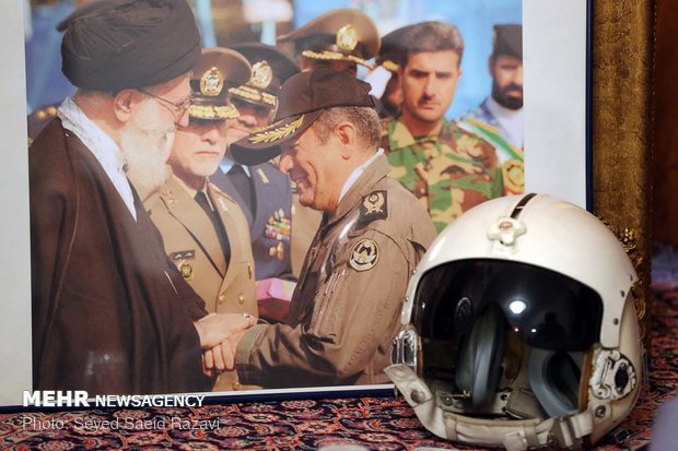 Rouhani visits families of martyrs, war veteran