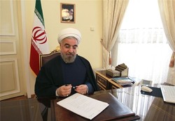 Rouhani urges closer ties with Pakistan as Khan takes office