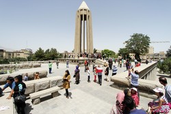  Travelers visit the popular mausoleum of Avicenna in Hamedan, west central Iran.