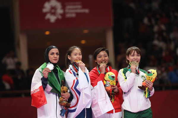 Iranian woman athlete gains silver in Asian Games