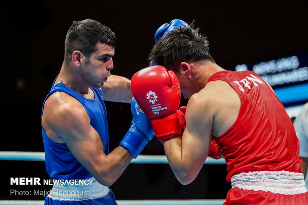 Iranian boxer defeats Japanese to reach quarterfinals at 2018 Asia Games