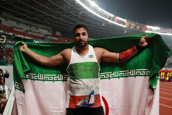 Discus thrower Haddadi clinches gold medal in Asian games