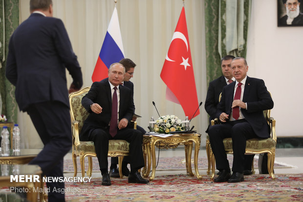 Russian and Turkish presidents meet in Tehran
