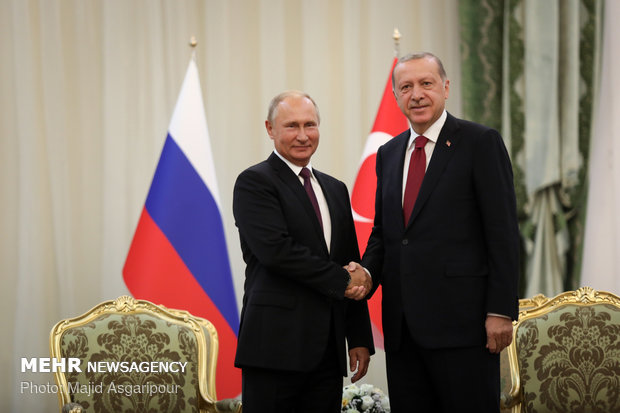 Erdoğan Özbekistan'da Putin ile görüştü