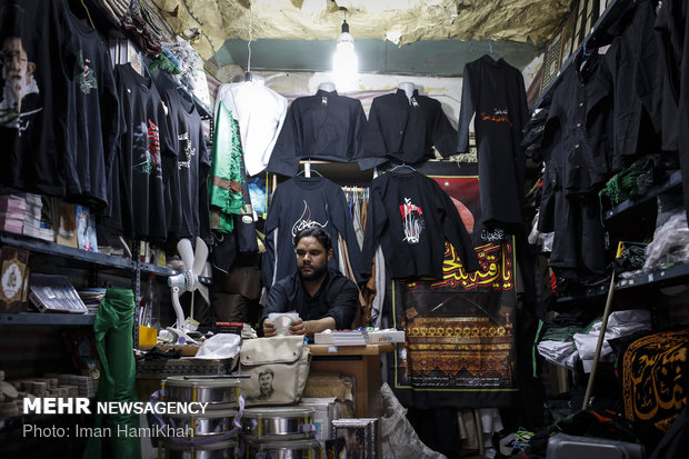 Vending mourning attires, apparatus in Hamedan bazaar during Muharram