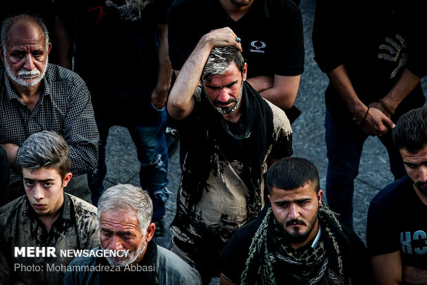 Tent-burning ceremony on Ashura day in Imam Hussein (AS) Sq. in Tehran 