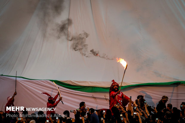 Tent-burning ceremony on Ashura day in Imam Hussein (AS) Sq. in Tehran 