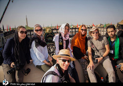  A file photo depicts foreign travelers visiting Muharram mourning rituals in Yazd, October 1, 2017.