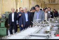 The vice president for science and technology Sourena Sattari (middle) visits a knowledge-based company in Ardebil on Monday