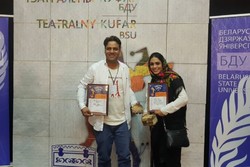 Director Farzin Nobarani (L) and actor Shabnam Eskandari pose after being honored at the 15th Teatralny Kufar International Student and Youth Theater Festival in Minsk, Belarus on September 28, 2018.