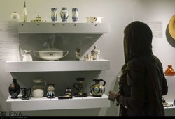 A woman visits “Dutch Archaeology and Art”, on loan from Drents Museum, at the National Museum of Iran on October 2, 2018. 
