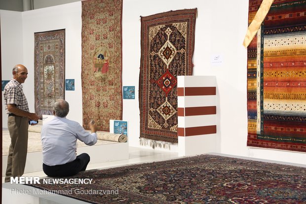 Making carpets in Qom: from dyeing to market