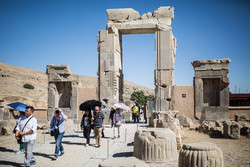 Foreign travelers visit the ruins of the UNESCO-registered Persepolis in southern Iran.    