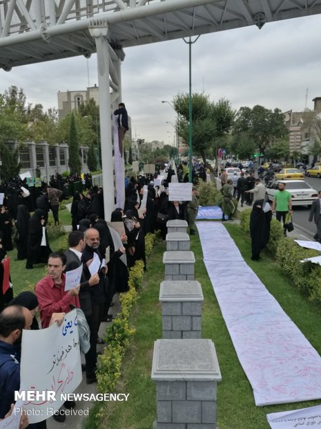 People convene in front of Parliament on FATF opposition 