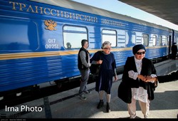 Luxury rail travelers on excursion across Iran