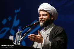 Hojjatoleslam Sheikh Mohammad Qomi, the chief of the Islamic Ideology Dissemination Organization delivering a speech at the first national conference on importance of family