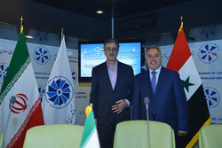 Head of Tehran Chamber of Commerce, Industries, Mines and Agriculture (TCCIMA) Masoud Khansari (L) and Mahmoud Hamsho, the secretary general of the Federation of Syrian Chambers of Commerce attending the Iran-Syria business forum in Tehran on Saturday