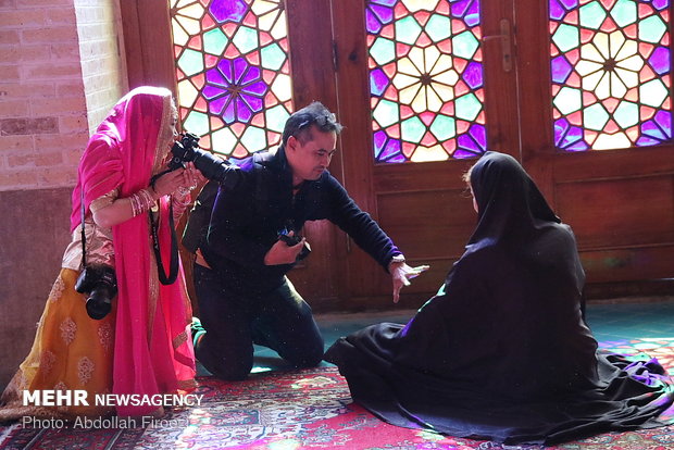 Autumn tourists visiting Nasir al-Molk Mosque in Shiraz