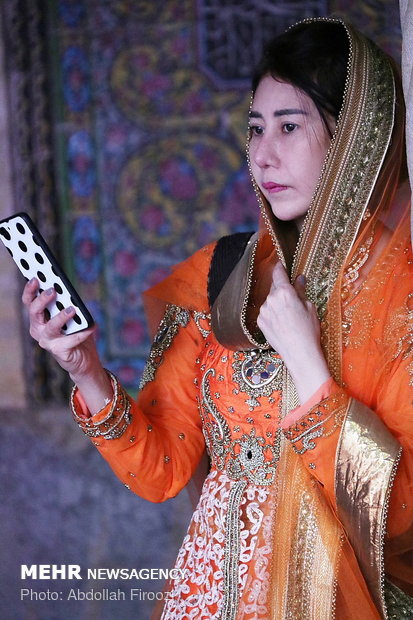 Autumn tourists visiting Nasir al-Molk Mosque in Shiraz