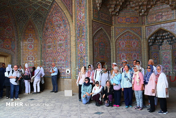 Autumn tourists visiting Nasir al-Molk Mosque in Shiraz