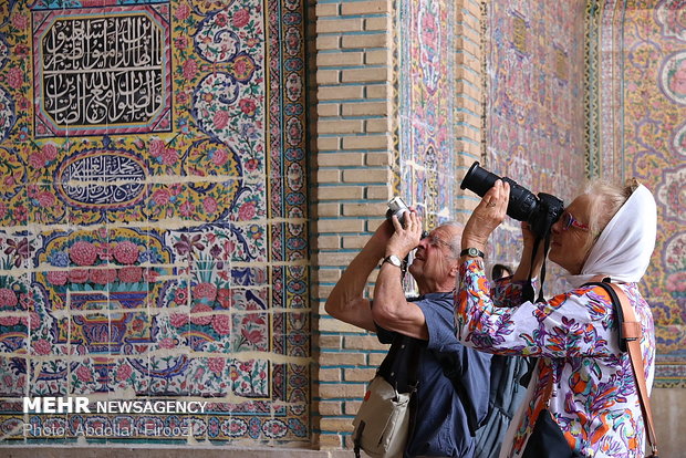 Autumn tourists visiting Nasir al-Molk Mosque in Shiraz