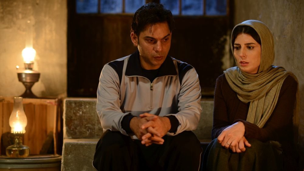 Peyman Maadi (L) and Leila Hatami act is a scene from “Bomb, a Love Story”.