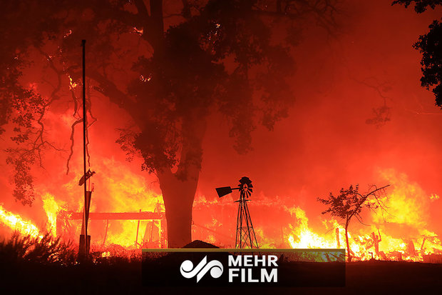 VIDEO: California wildfire lashes along freeway