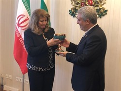 Iranian Vice President Ali-Asghar Mounesan (R) presents a gift to his Bulgarian counterpart Iliana Iotova during a visit to Sofia, November 16, 2018.