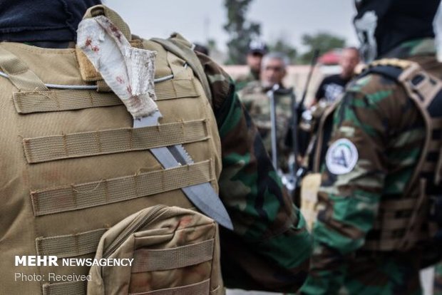 حەشد شەعبی هەرگیز چەکی خۆی دانانێت